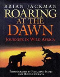 Roaring at the Dawn : Journeys in Wild Africa